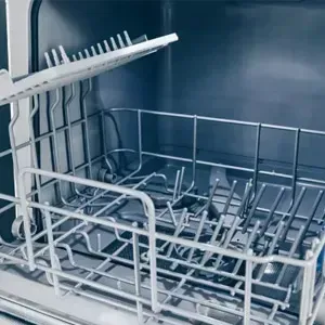 White Refrigerator in A Kitchen with A Brown Note