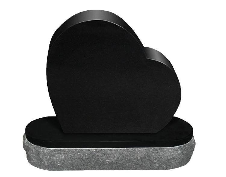 Black heart-shaped gravestone on a gray base