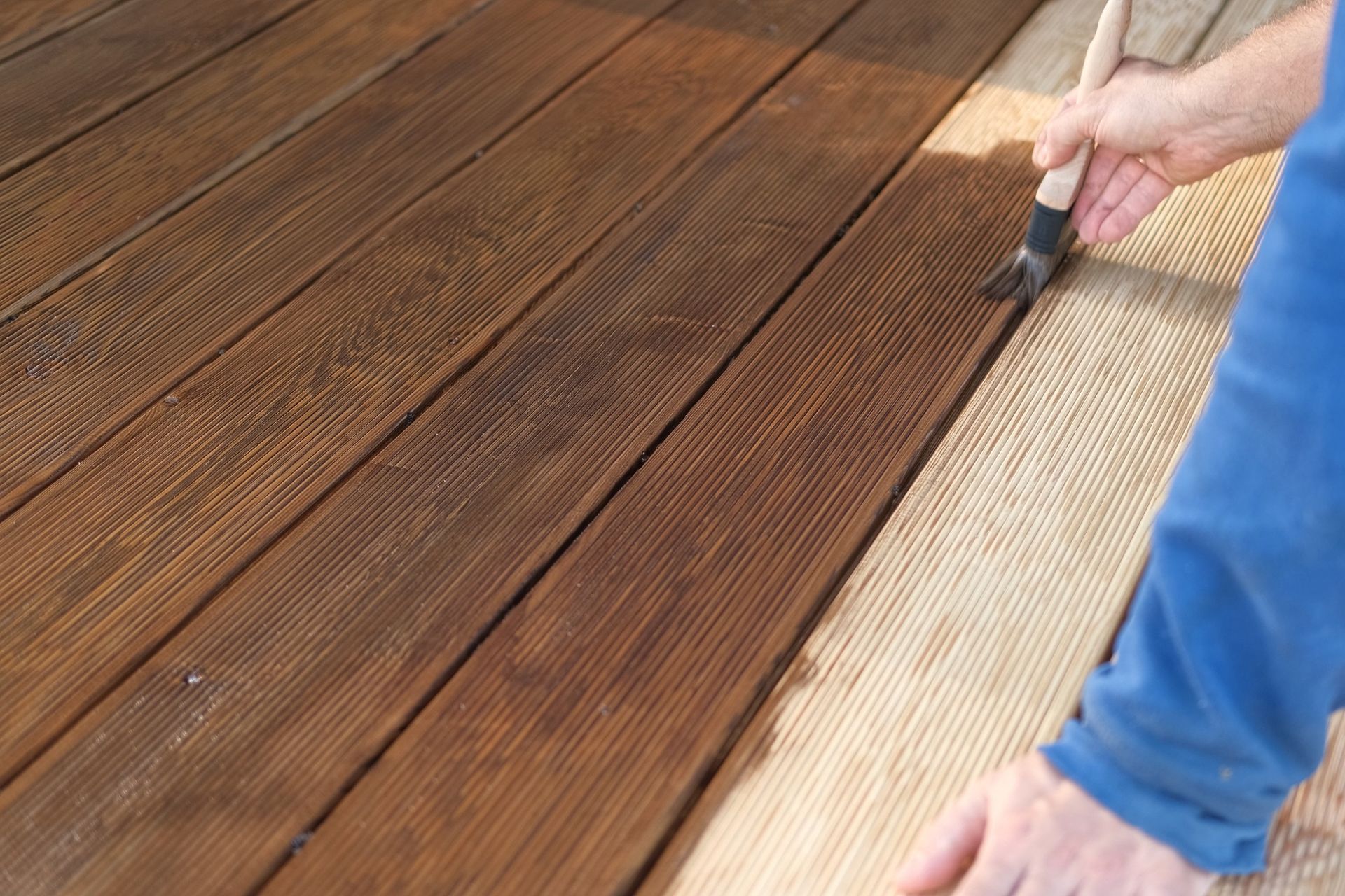 deck in western ma being stained in the summer