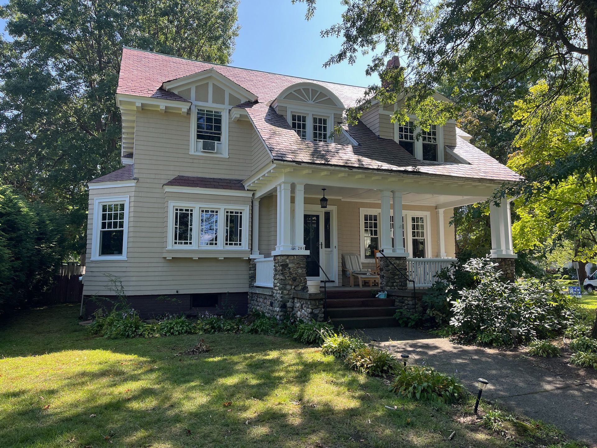 Front columns being painted by Pioneer Painters in Granby, CT