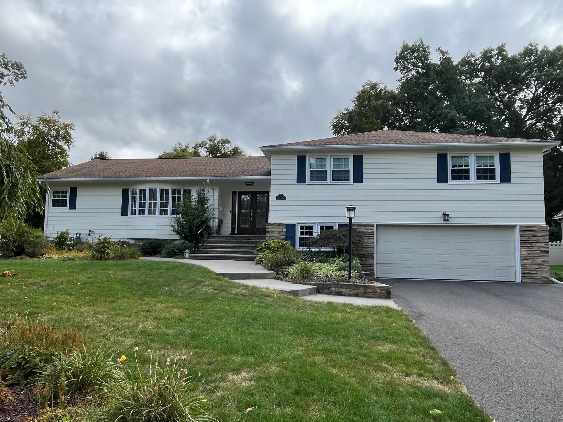 Residential siding refresh by Pioneer Painters in Amherst, MA