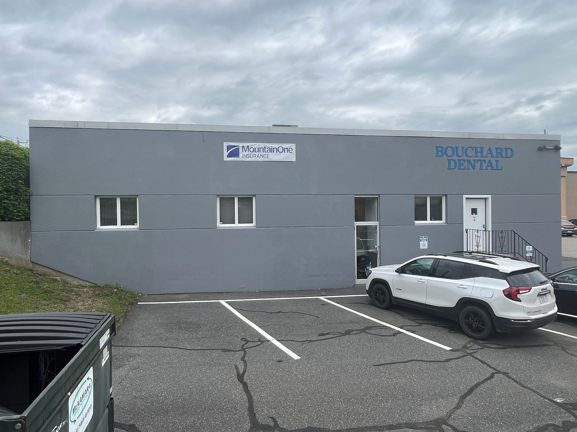 Storefront exterior being painted by Pioneer Painters in Springfield, MA