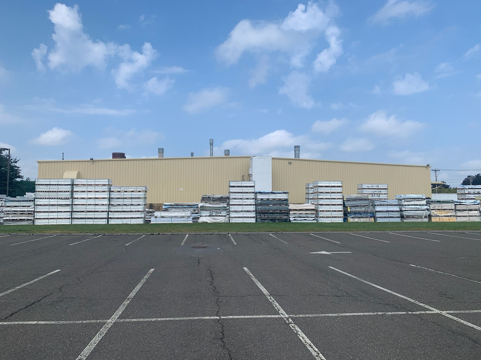 Warehouse exterior wall painting project by Pioneer Painters in Springfield, MA