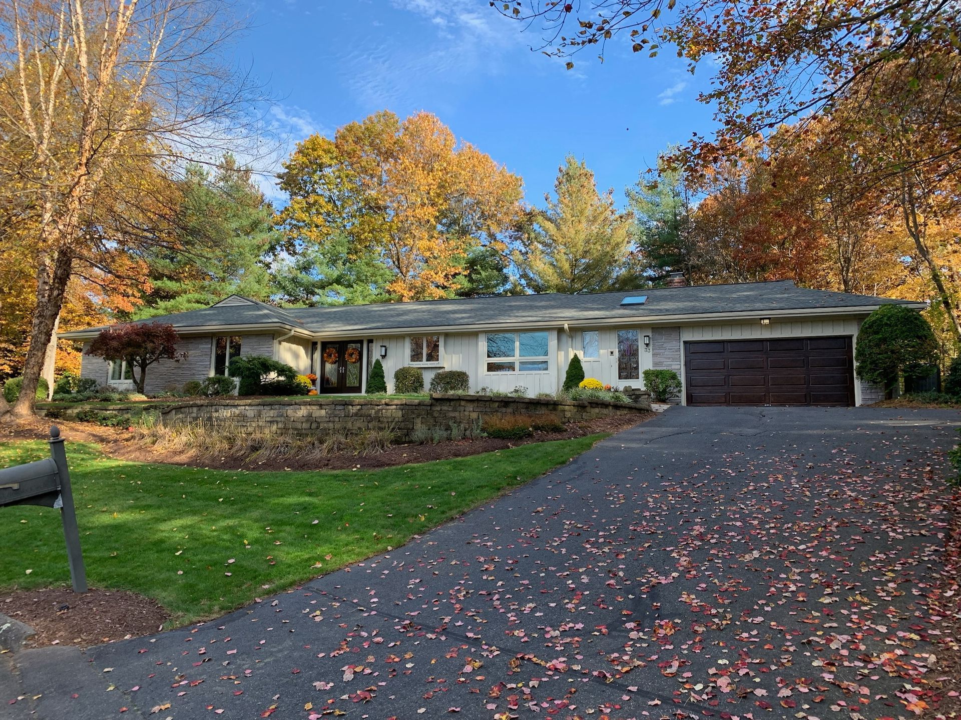 Exterior wall being painted by Pioneer Painters in Longmeadow, MA