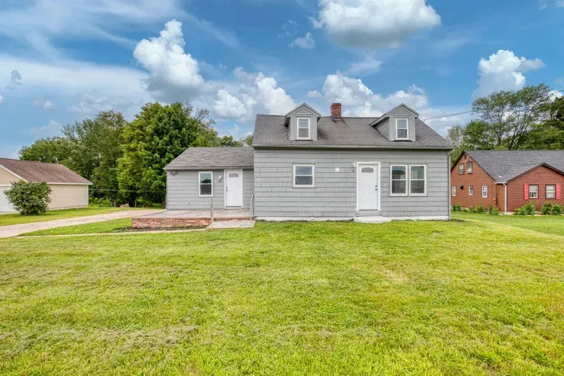 Exterior repaint of a farmhouse by Pioneer Painters in Monson, MA