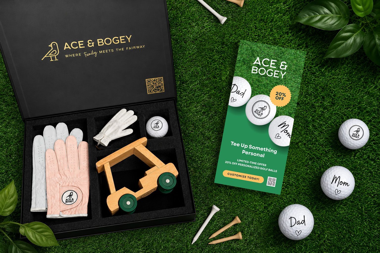 Wooden toy set with gloves, a golf cart, and golf tees on grass beside a black gift box