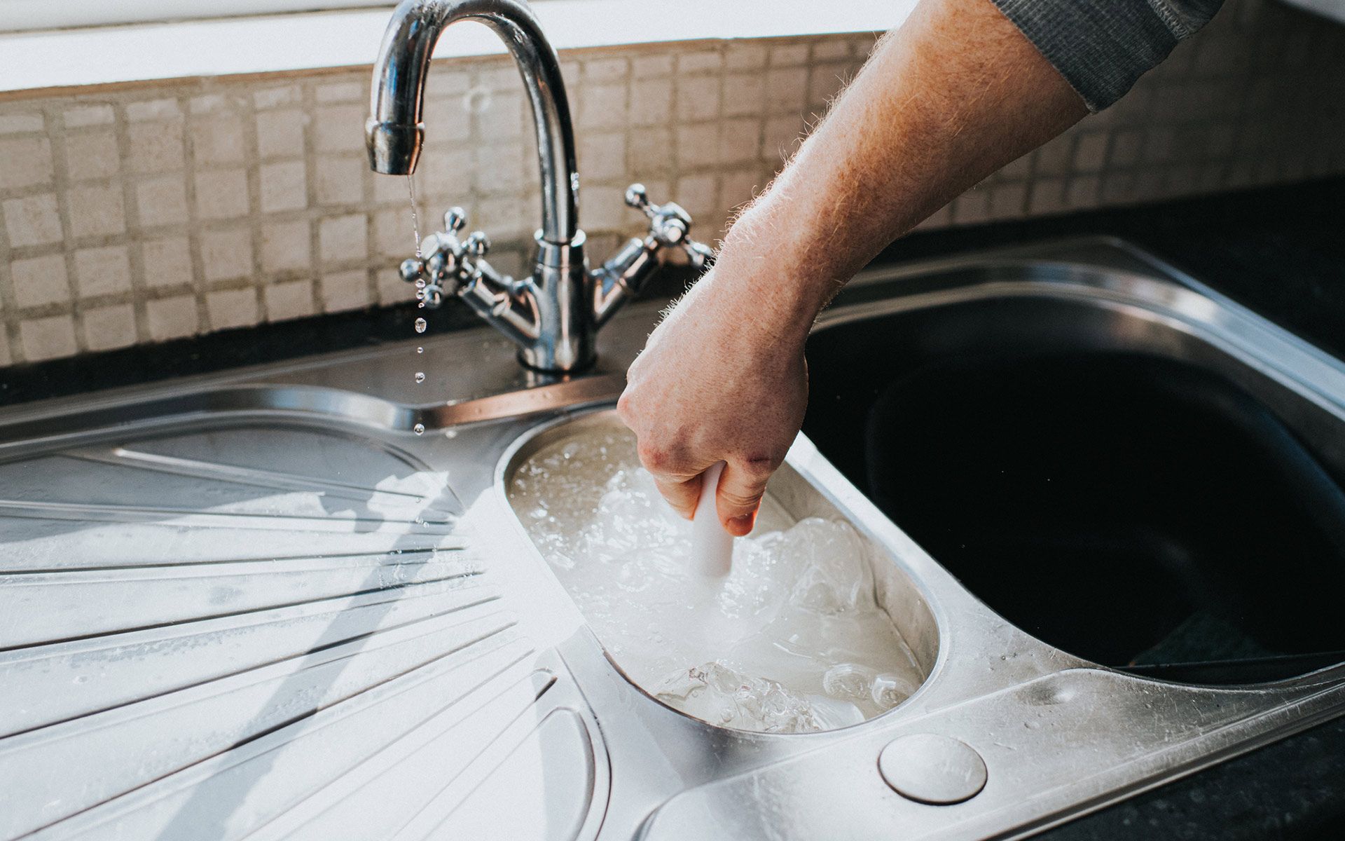Draining Sink — Lincoln, NE — Simmons Plumbing