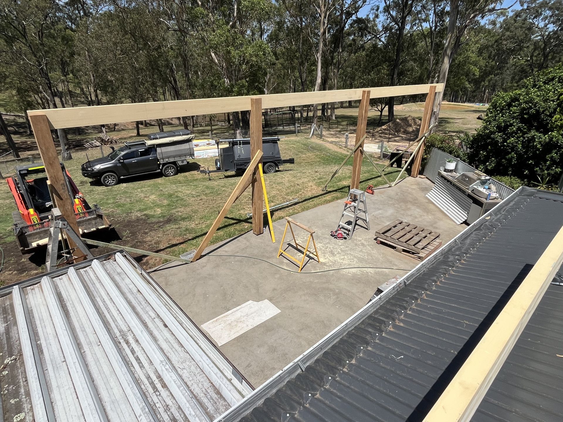 Aerial View of a Roof With a Wooden Structure Being Built — TM Built Construction In Rutherford, NSW