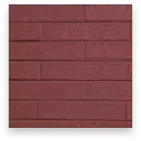 Red brick wall with horizontal mortar lines and a small white border at the bottom.