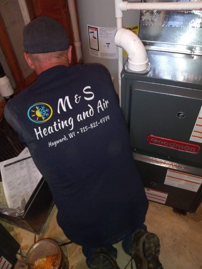 The Man Inspect the Water Heater-Hayward, WI-M & S Heating and Air LLC The Man Inspect the Water Heater-Hayward, WI-M & S Heating and Air LLC