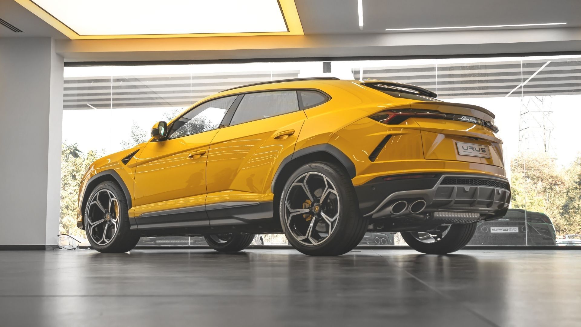 lamborghini urus in garage