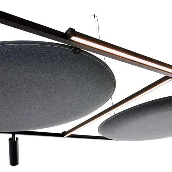 Circular modular acoustic panels with integrated lighting for modern interiors.