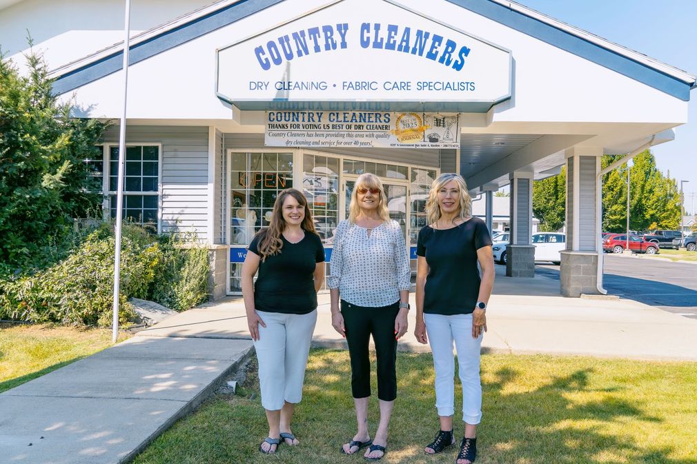 Country Cleaners staff outside the Hayden, Idaho dry cleaning shop