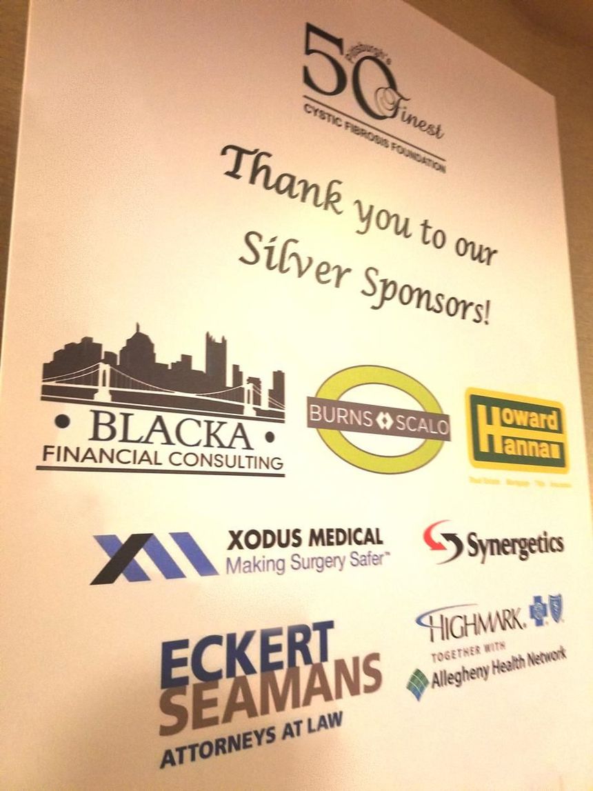 Sponsor poster thanking Silver Sponsors with multiple company logos on a beige background