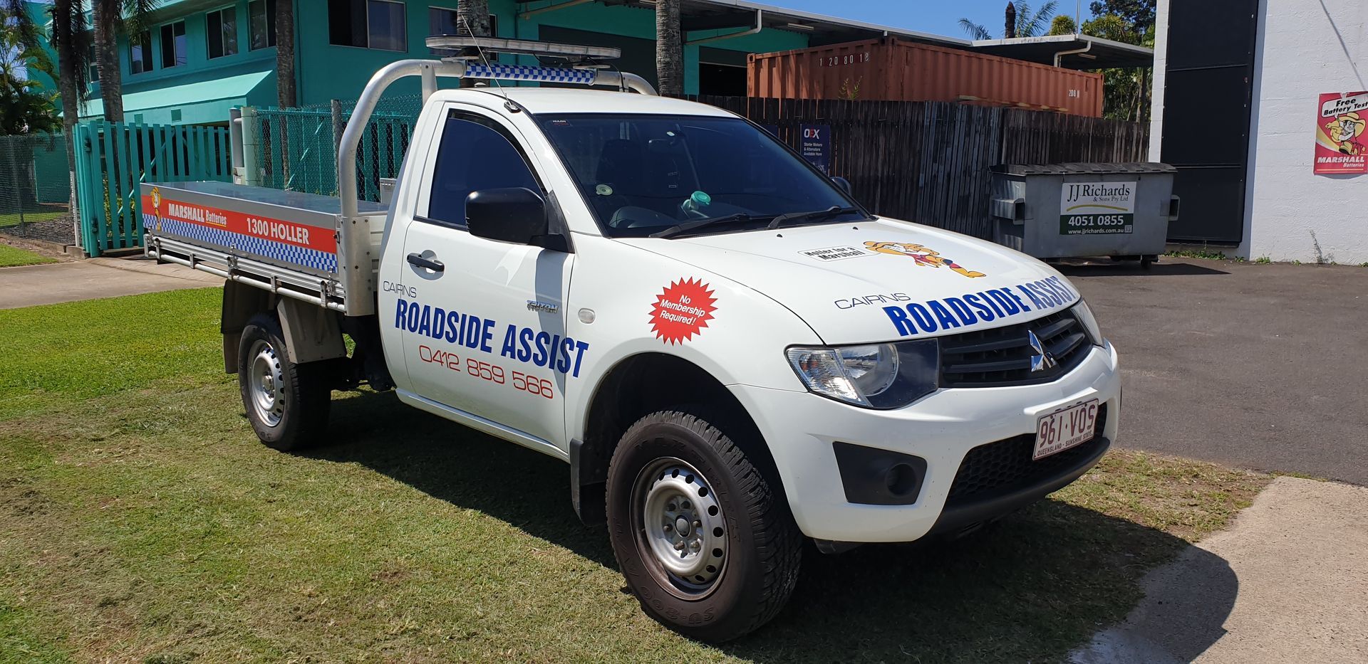 A White Truck On A Grass Side — Cairns Roadside Assist In Gordonvale, QLD