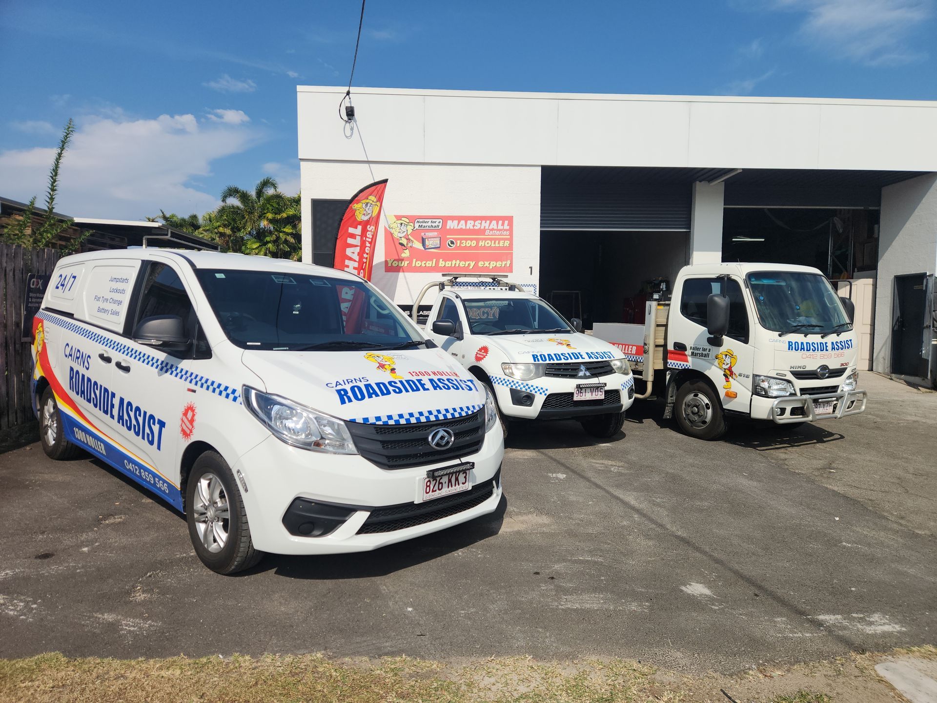 A Man Is Changing A Tire On A Trailer β Cairns Roadside Assist In Manunda, QLD