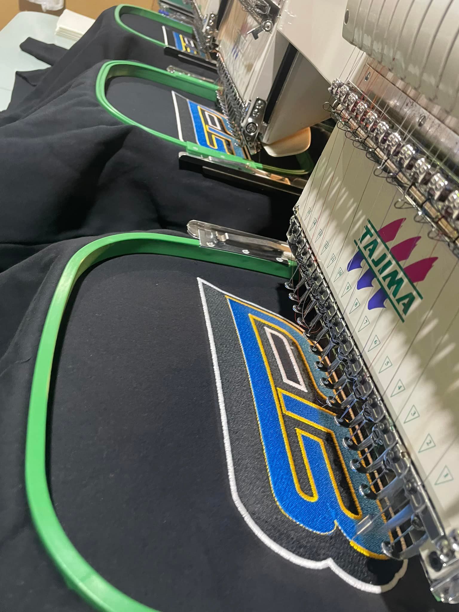 Expertly embroidered with blue and Yellow thread, showcasing intricate craftsmanship — Screen Printer in Dubbo, NSW