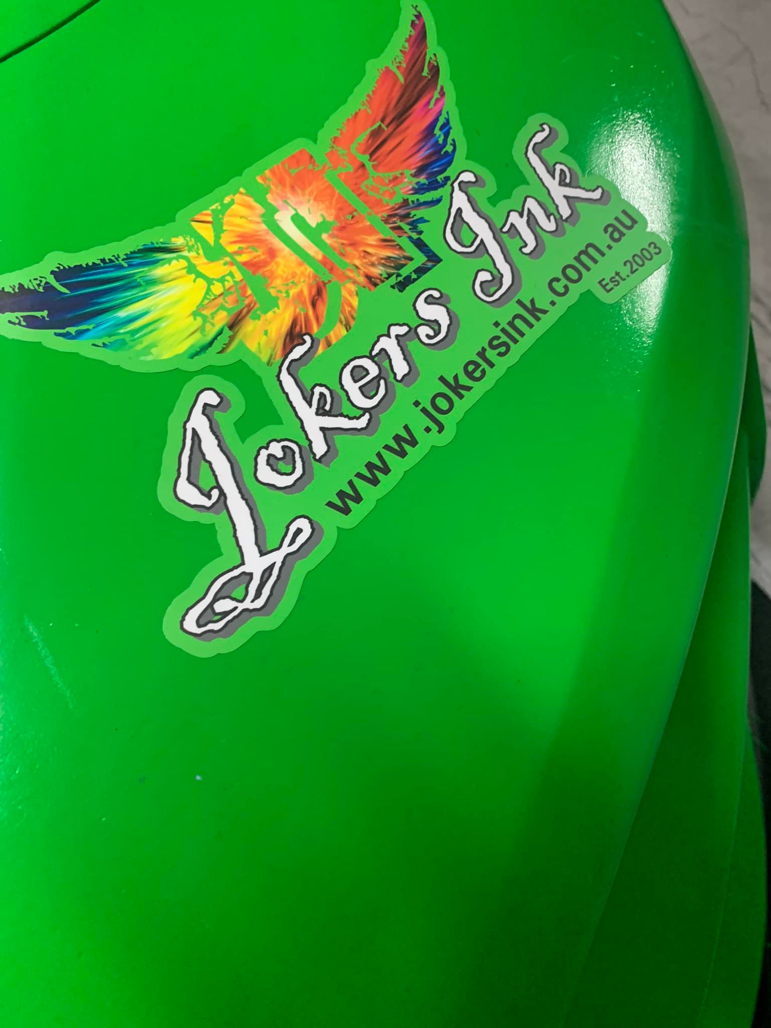 Jokers Ink logo printed on green fabric for a vibrant and eye-catching design — Screen Printer in Dubbo, NSW