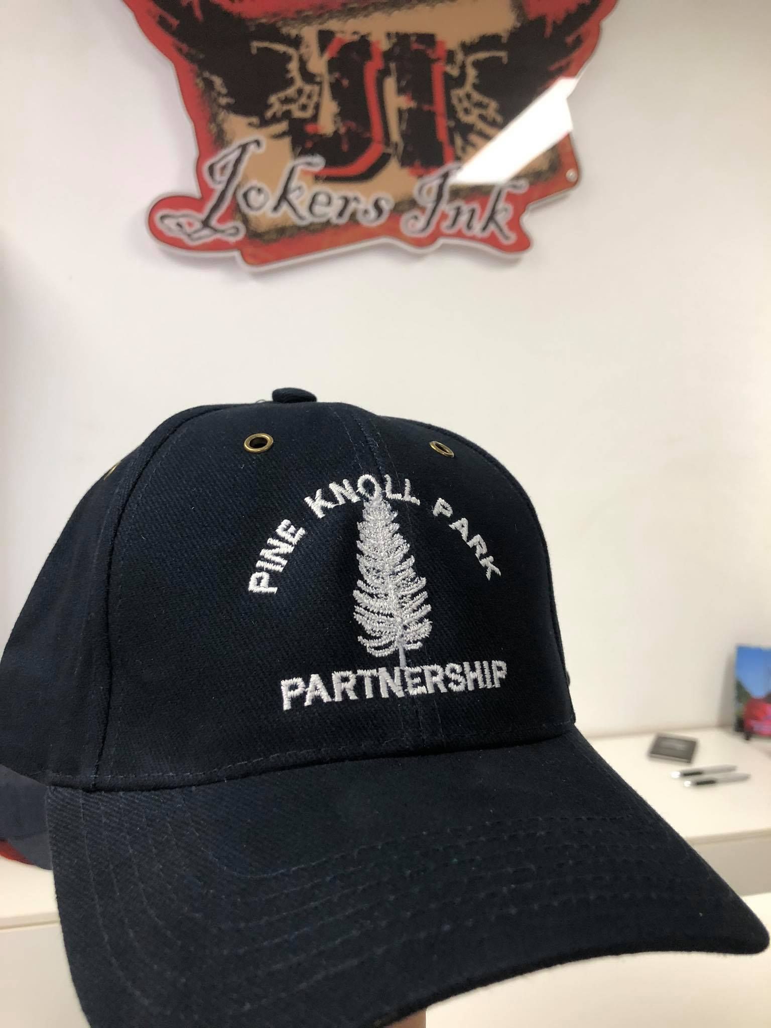 Cap with embroidered letter 'P' showcasing intricate stitching — Screen Printer in Dubbo, NSW