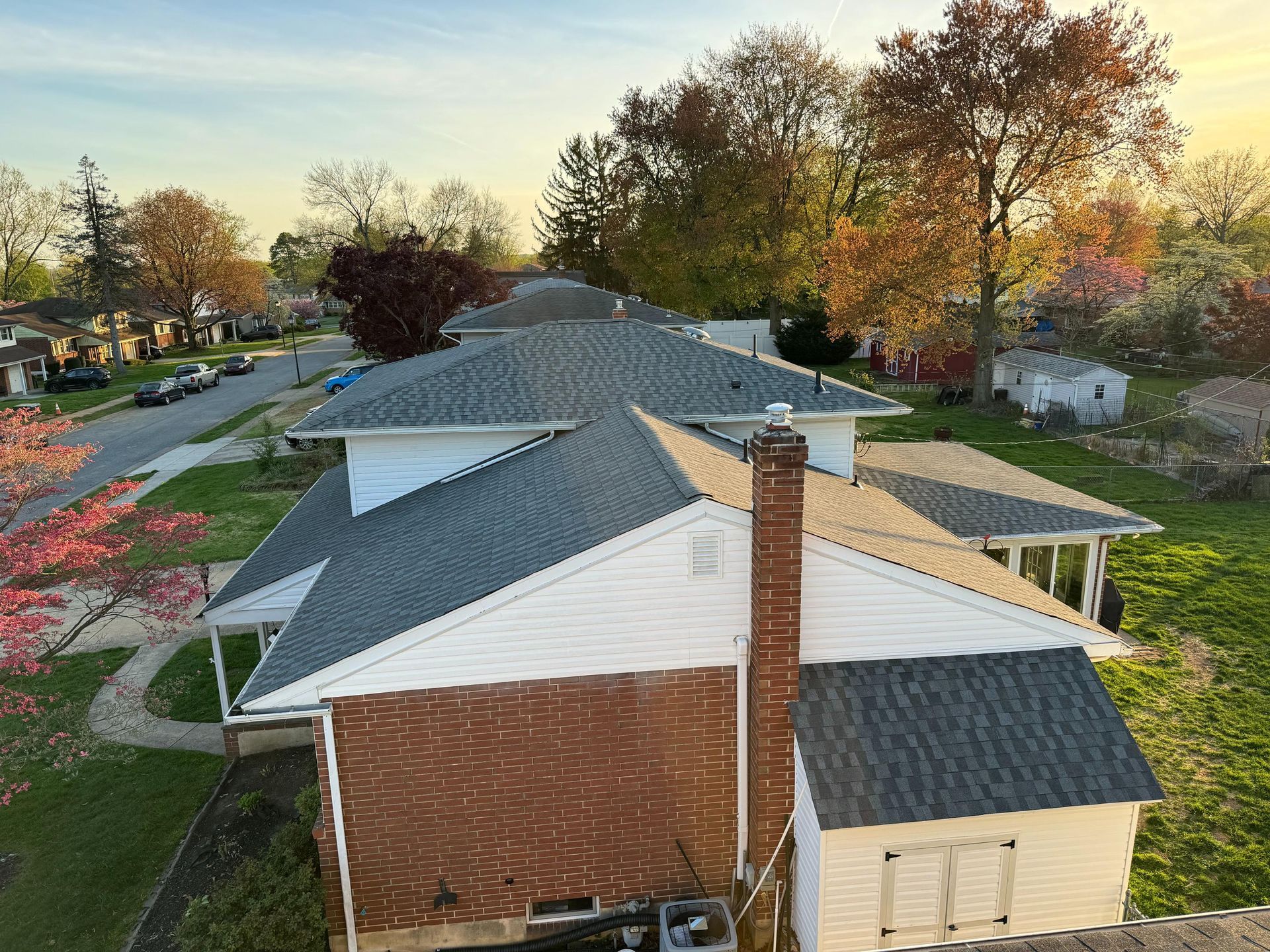 An aerial view of a row of houses in a residential area.