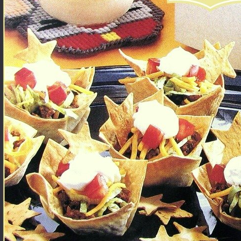 using star cookie cutters to cut out pastry stars