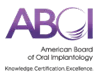 Logo of the American Board of Oral Implantology (ABOI) featuring stylized purple text and a circular graphic element.