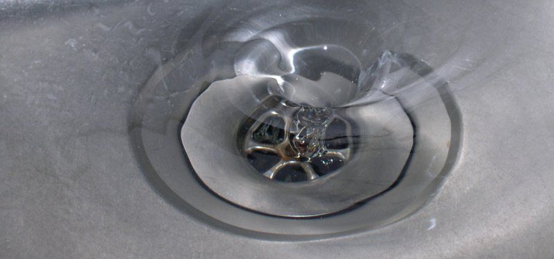 how to unblock a sink with a plunger