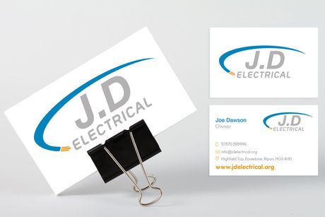 A business card for j.d electrical is attached to a clip