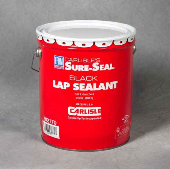 Red can of Carlisle Sure-Seal Black Lap Sealant with white lid and handle.