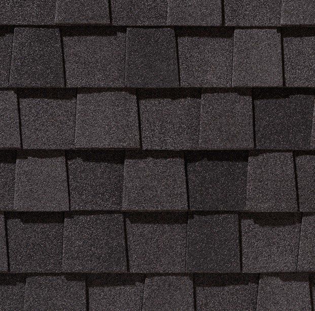 Dark gray asphalt roof shingles.