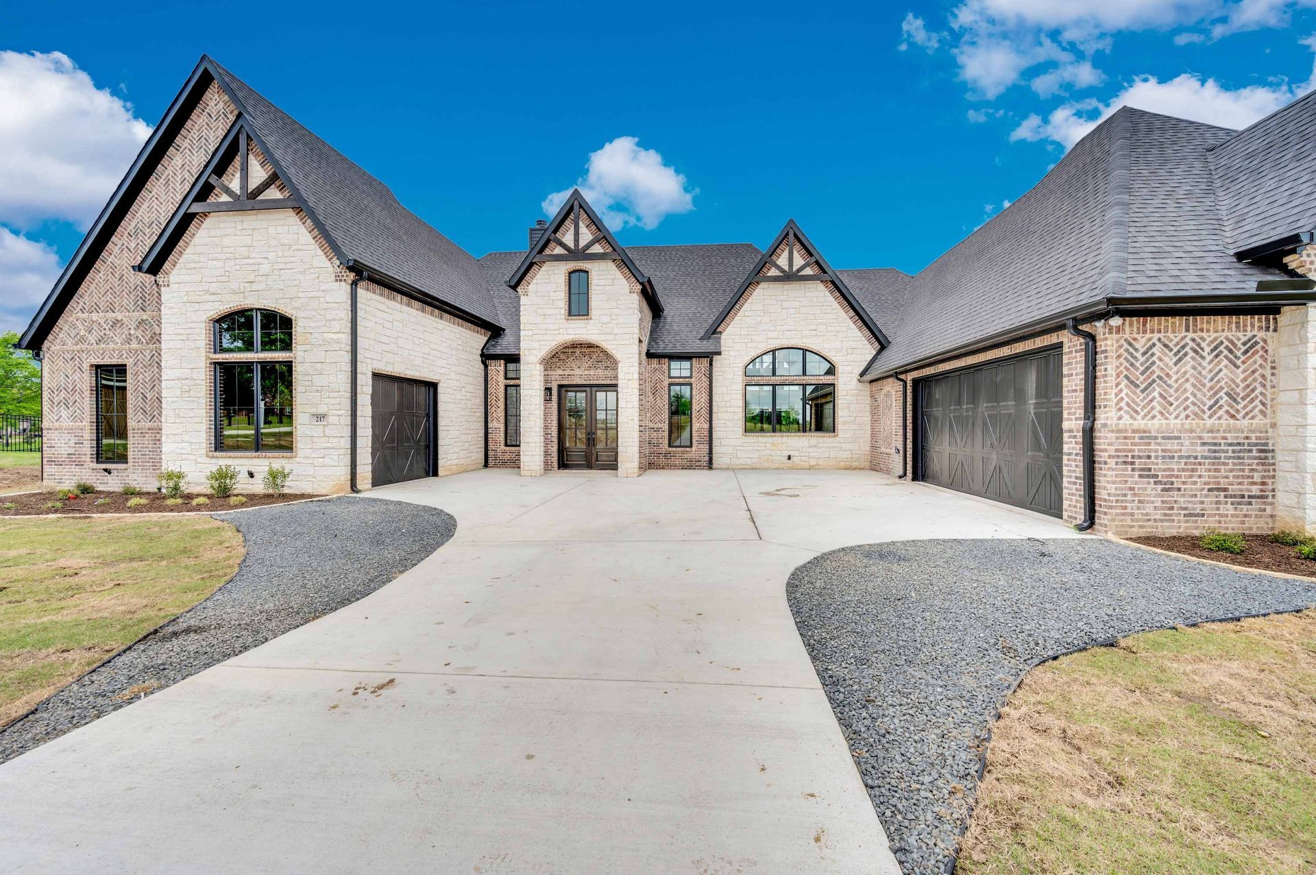 aerial view of custom home with backyard pool in North Texas