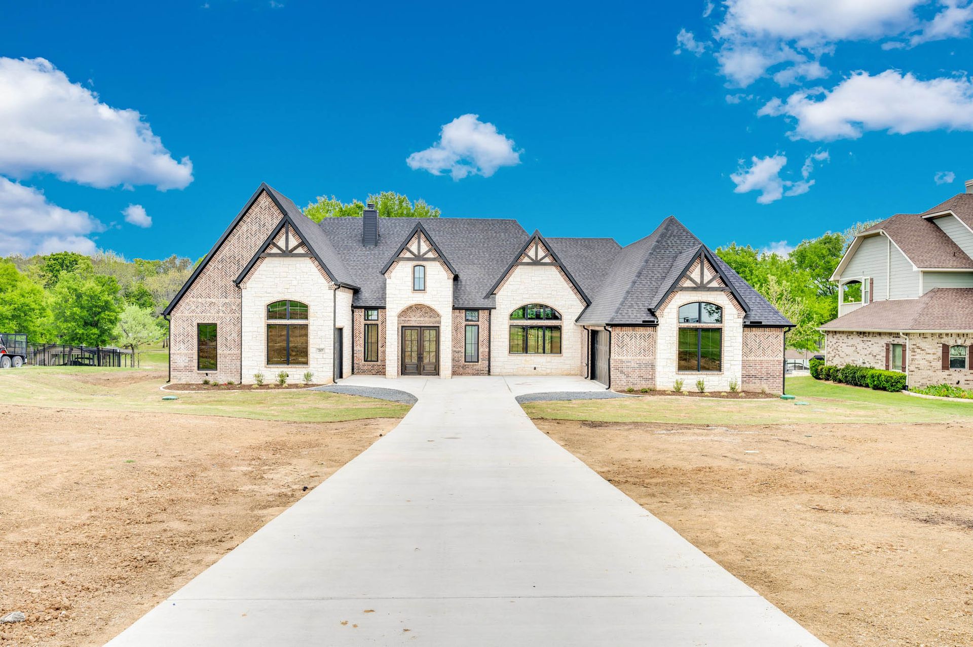 custom home exterior with driveway in North Texas