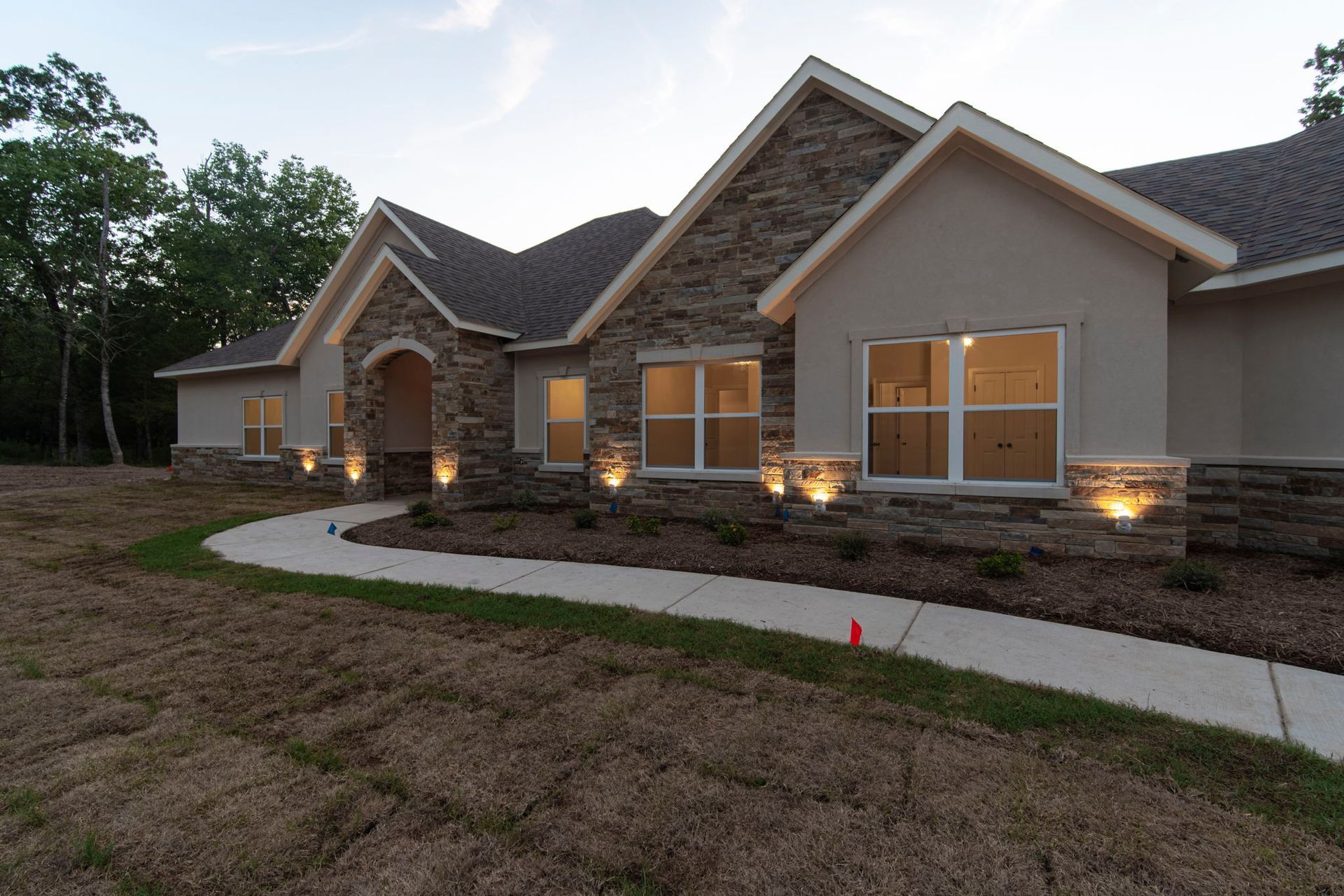 aerial view of custom home with backyard pool in North Texas