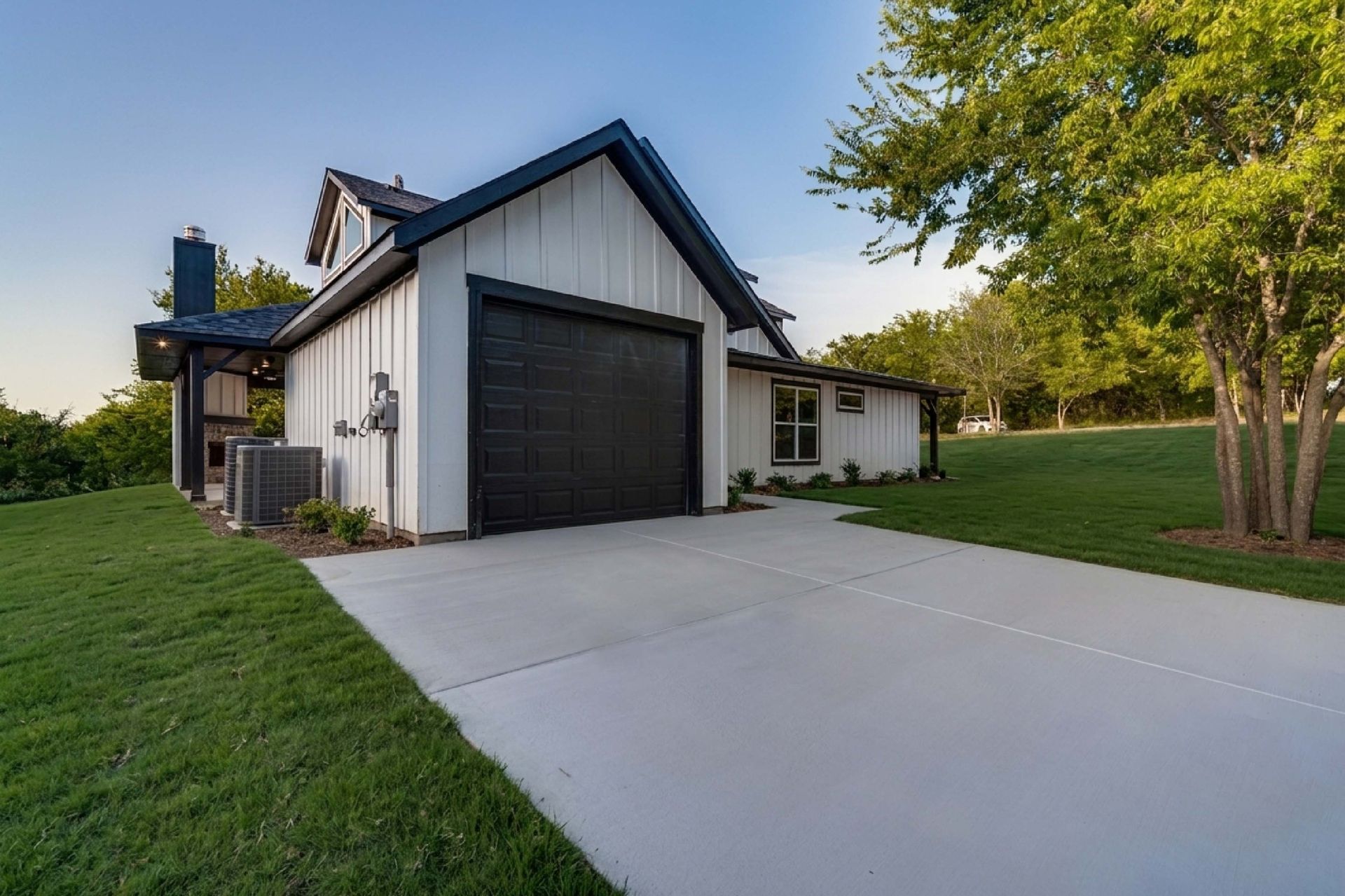 custom home exterior with driveway and garage in North Texas