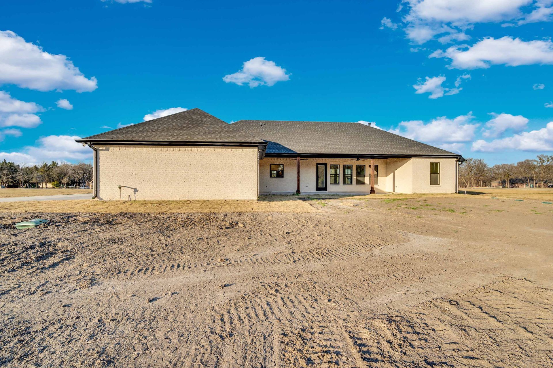 custom home exterior with modern farmhouse design