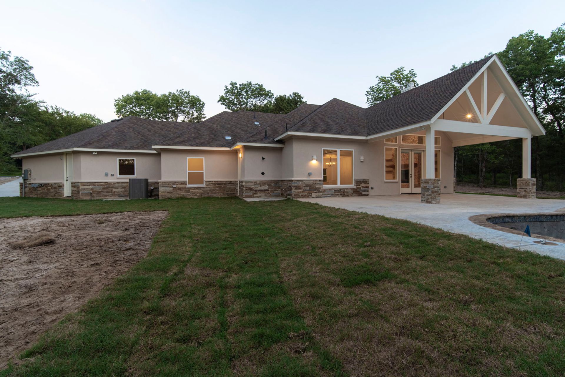 custom home exterior with modern farmhouse design