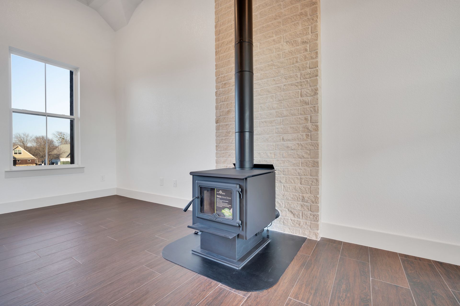 living room with wood stove and modern interior