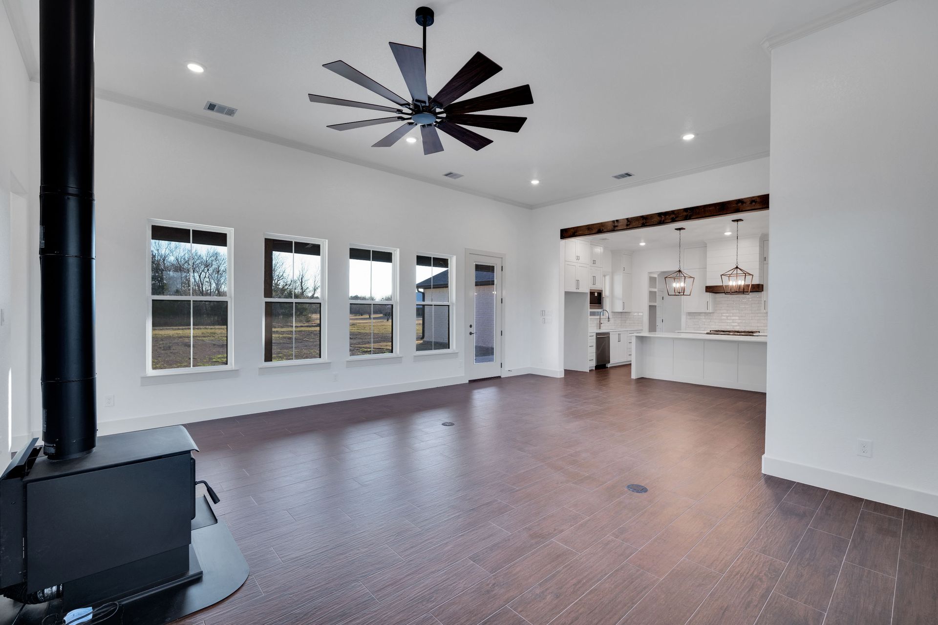 home entryway with chandelier and front door