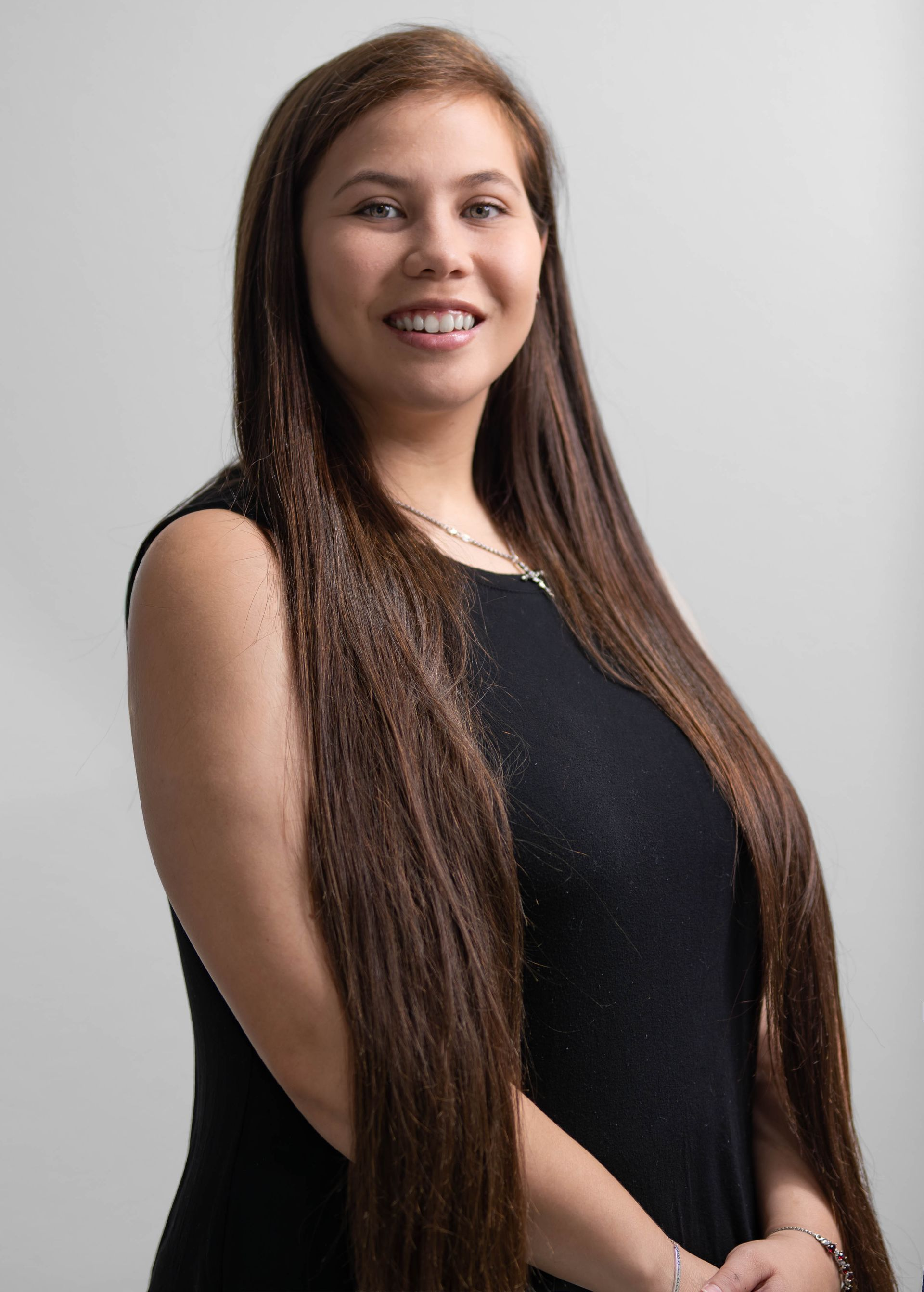 team member headshot smiling
