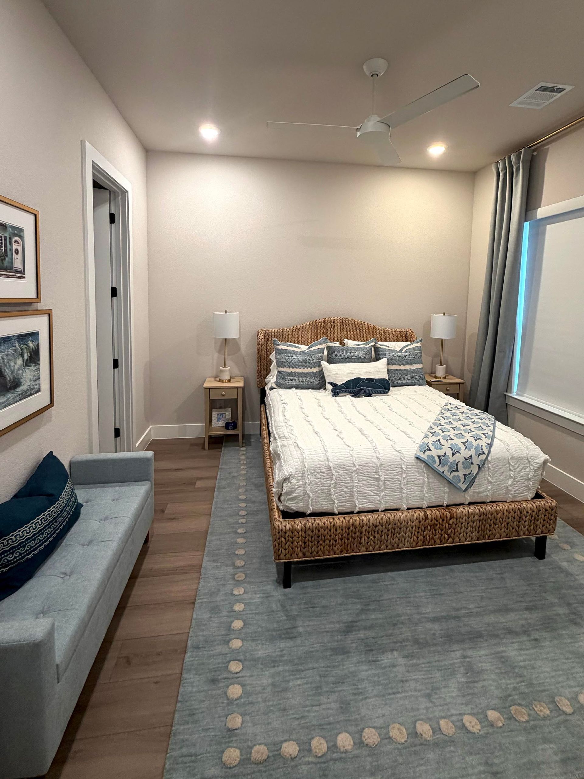bedroom interior with ceiling fan and neutral finishes