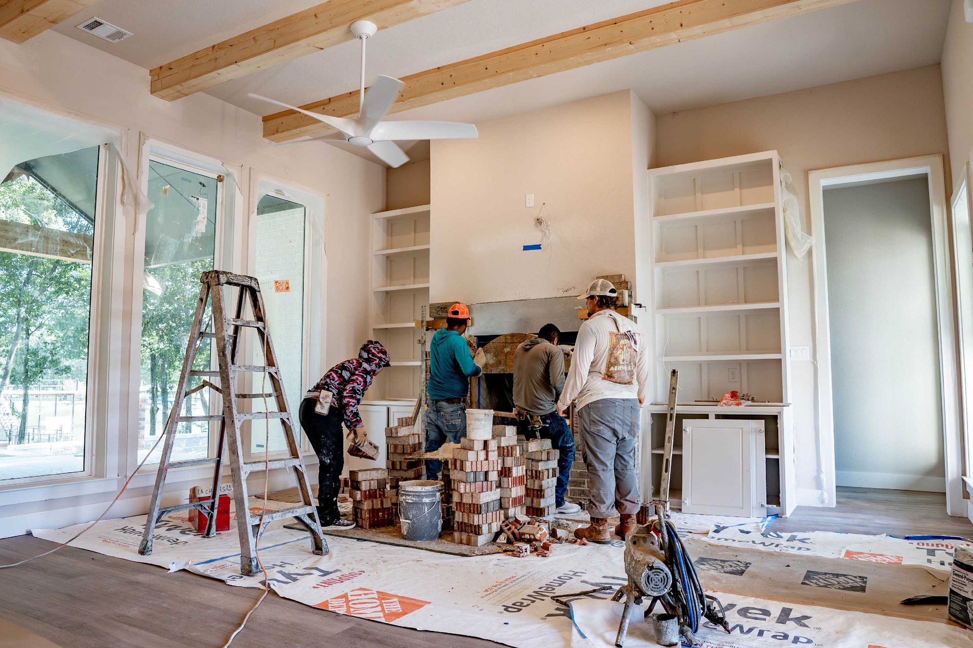 home renovation in progress with construction crew