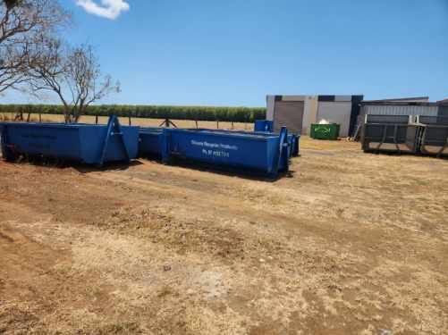 A Line Up Gray Bins - The Scrap Metal Recyclers in Bundaberg, QLD