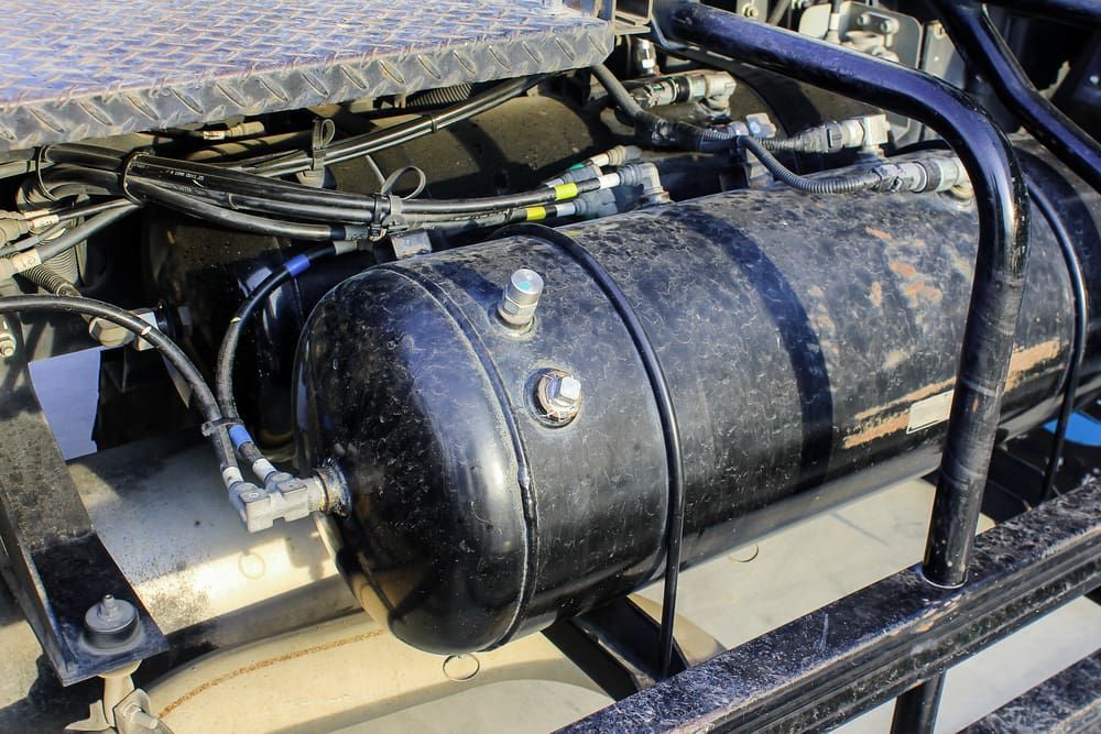 A Black Air Tank Is Sitting On The Side Of A Truck — A & D Automotive Technicians in Mackay, QLD