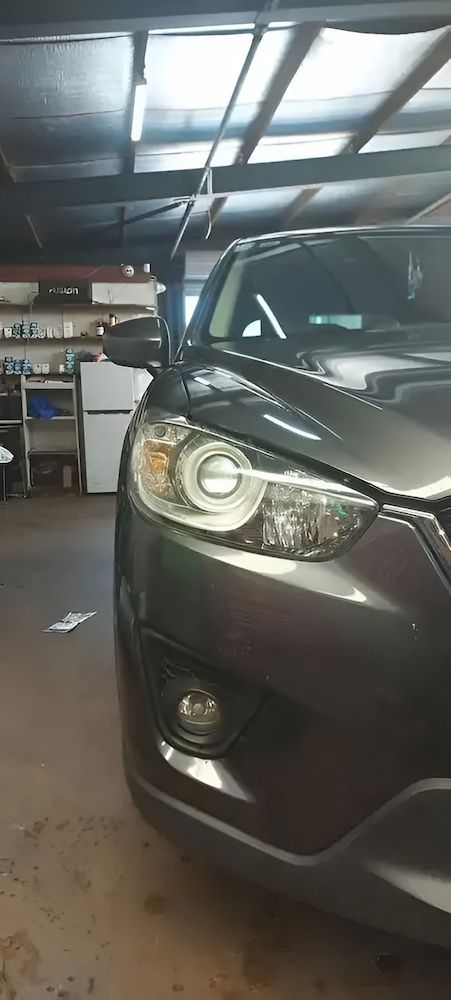 A Gray Car Is Parked In A Garage — A & D Automotive Technicians in Mackay, QLD