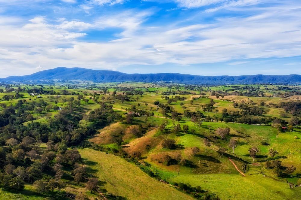 An Aerial View Of A Lush Green Valley With Mountains — A & D Automotive Technicians in Pioneer Valley, QLD