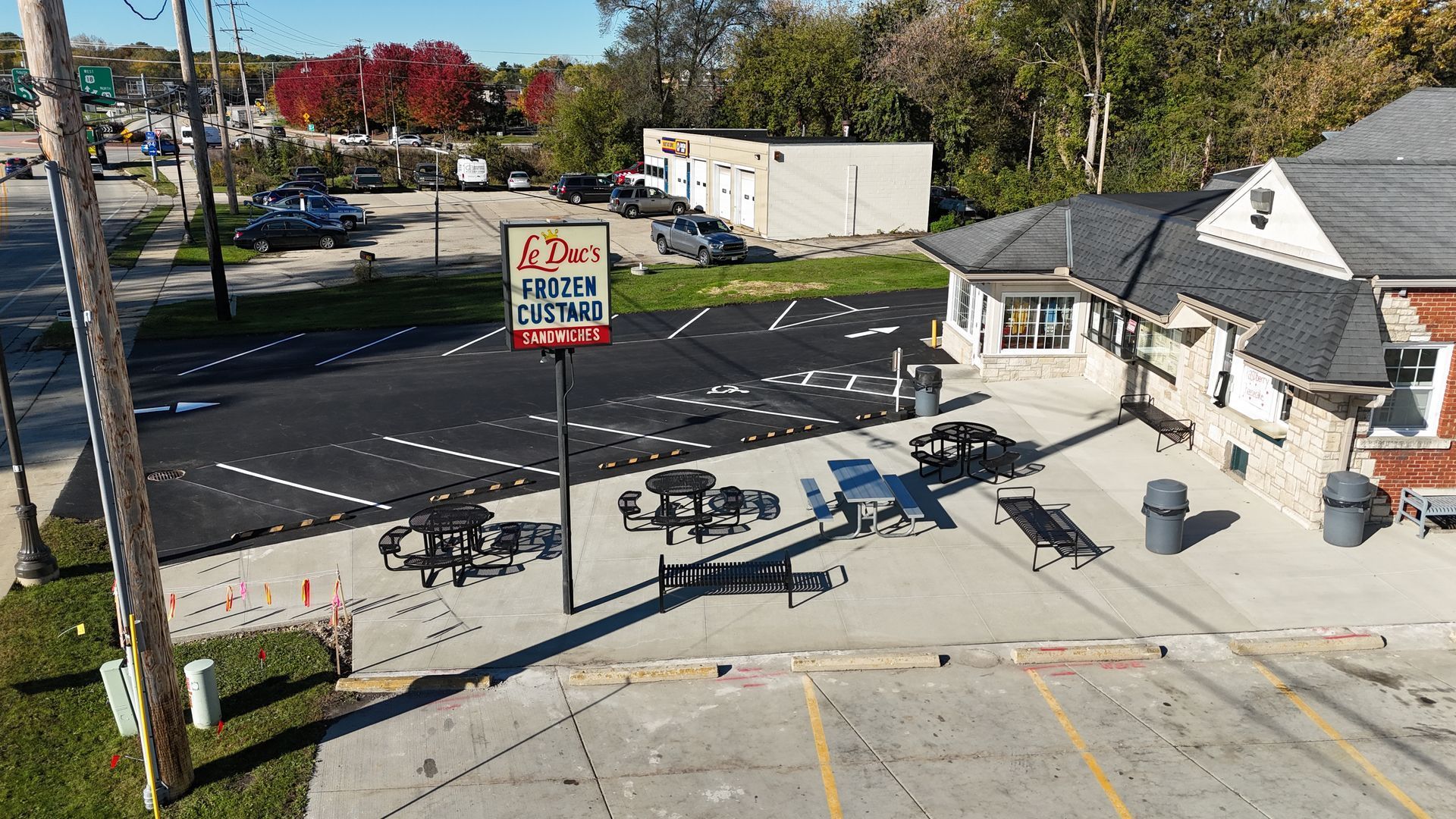 Freshly paved and striped parking lot at Le Duc’s Frozen Custard