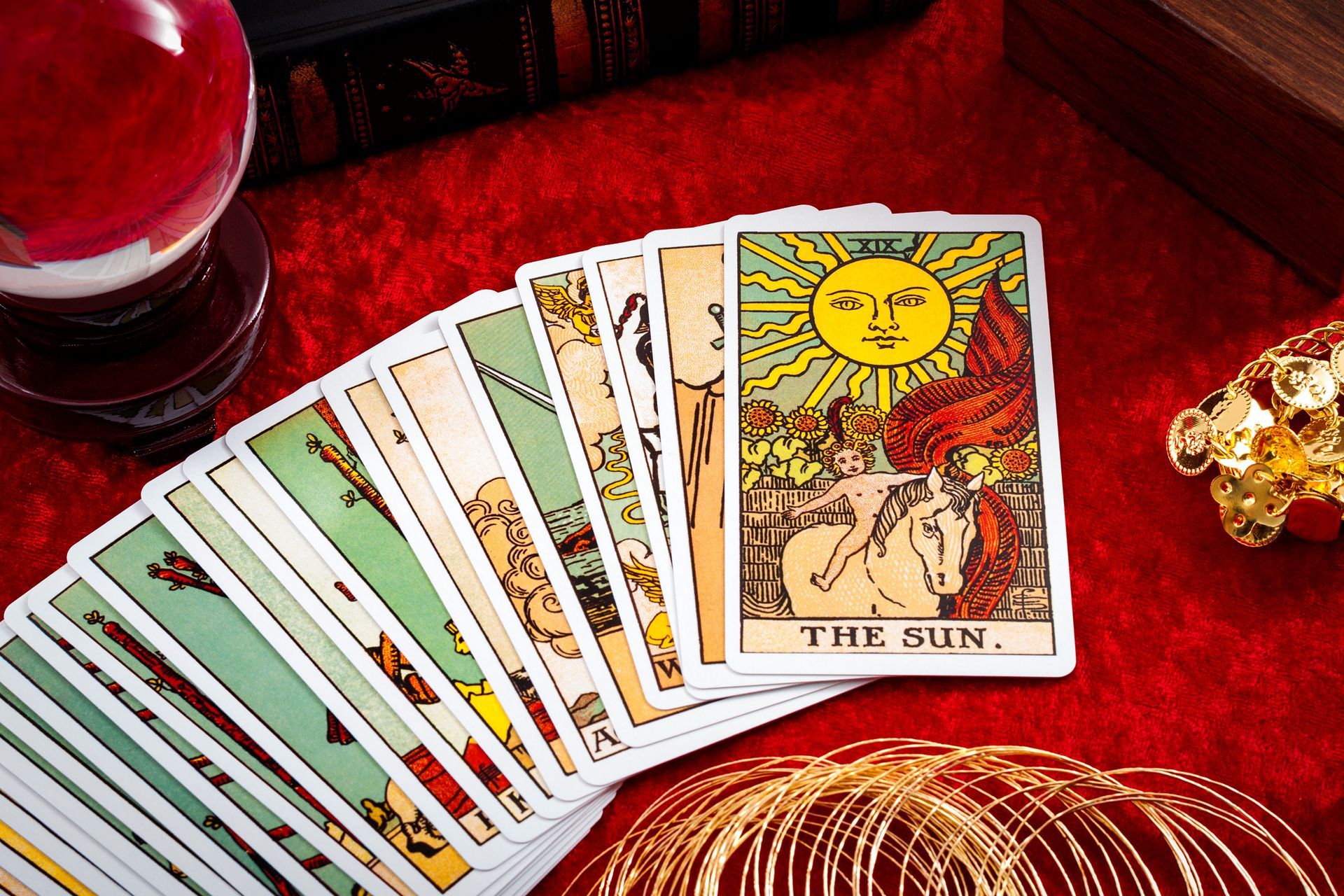 Tarot card reading setup with deck and crystal ball in Dallas, TX.