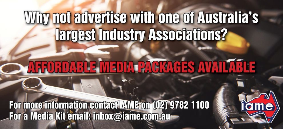 Advertisement: automotive engine with tools. 