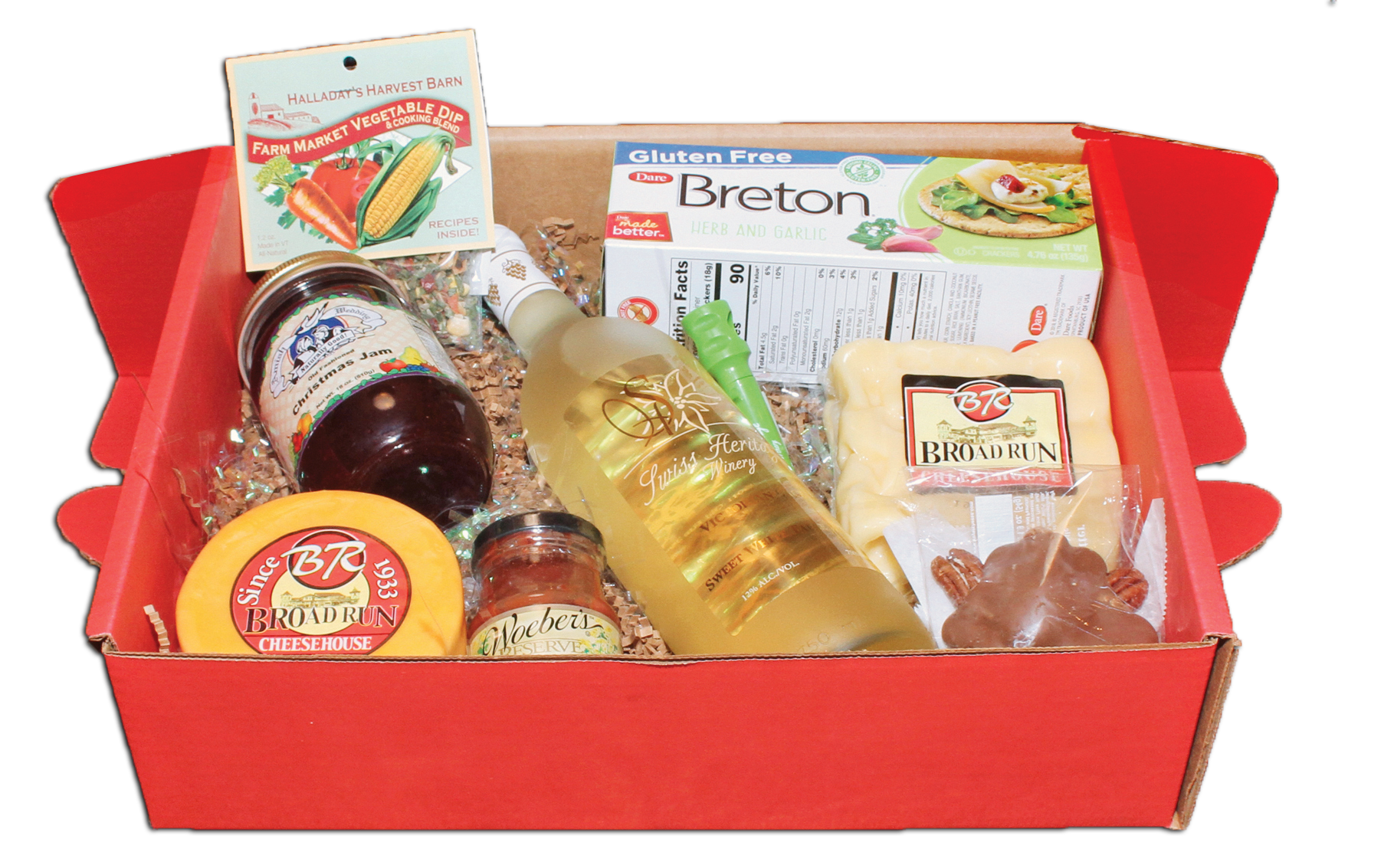 Red gift box with food items: cheese, wine, crackers, jam, and sweets.