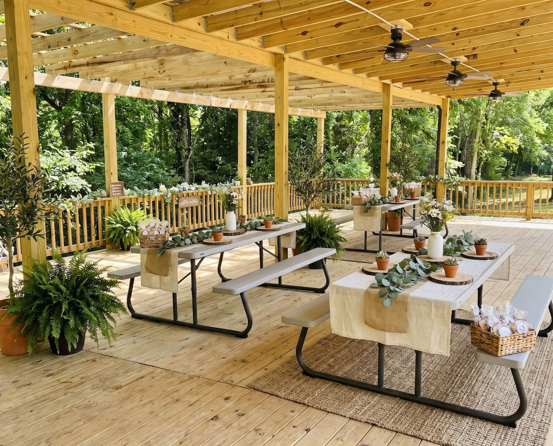 Outdoor event tables under a wooden pergola